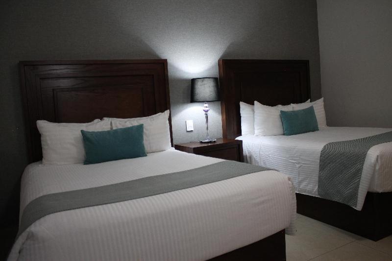 Hotel Suites Mexico Plaza Leon Campestre Zimmer foto